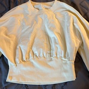 Cropped yellow Lululemon sweatshirt
